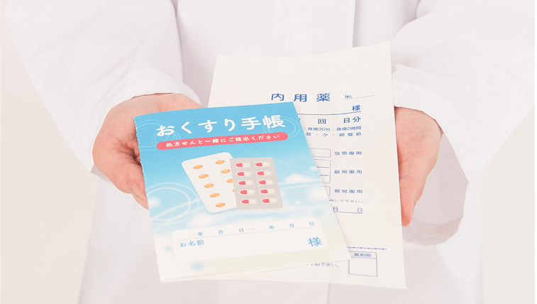 お薬手帳と薬袋の画像